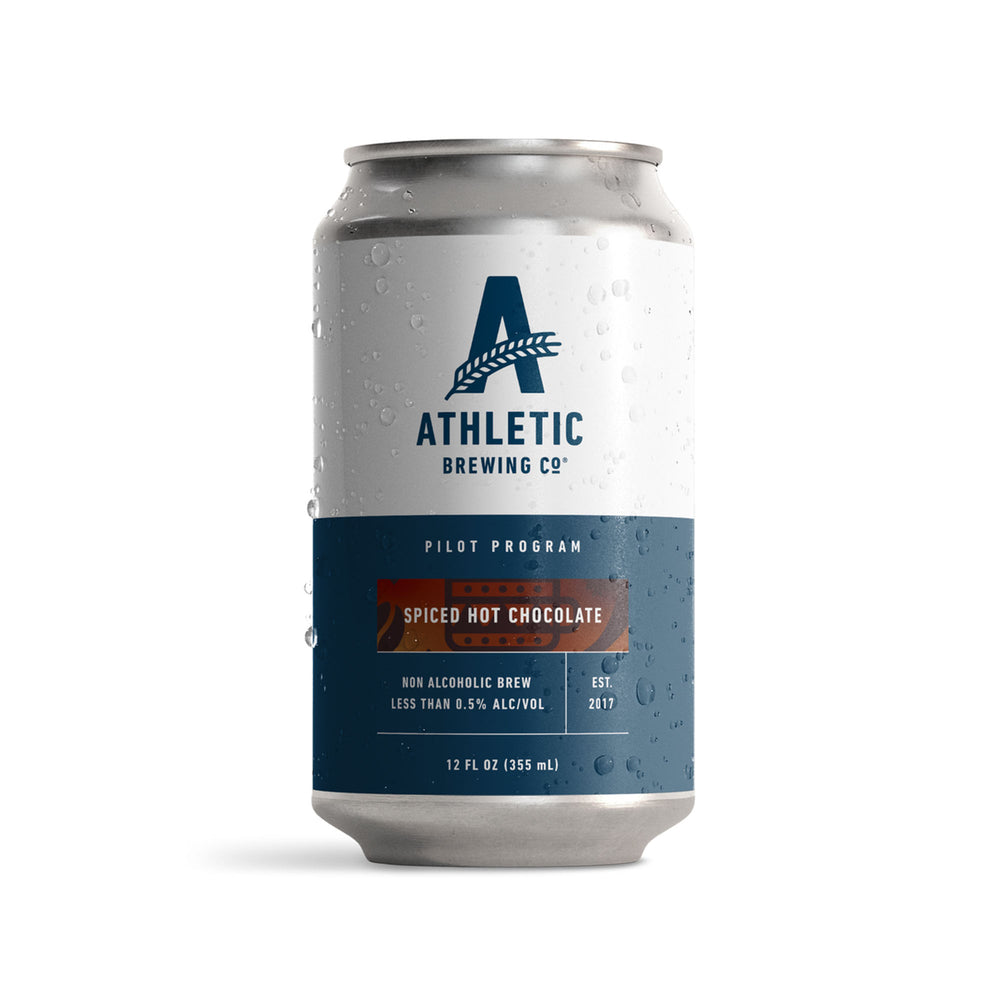 
            
                Load image into Gallery viewer, Athletic Brewing Co. — Spiced Hot Chocolate, Non-Alcoholic Dark, 6-pack of 12 oz cans
            
        